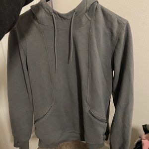 Gray woman’s ADIDAS sweater